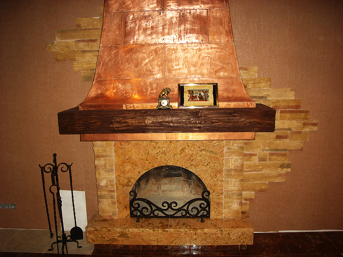  Fireplace faced with polished marble limestone and Cavan copper 